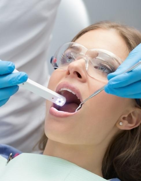Woman receiving a dental exam