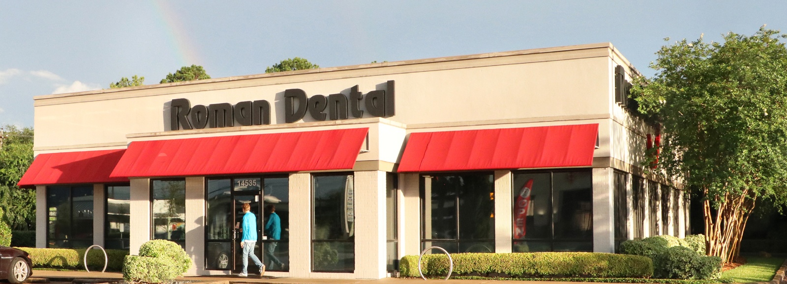 Outside view of Roman Dental office in Houston