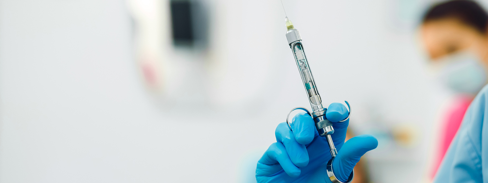 closeup syringe with anesthesia dental clinic