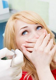 Woman afraid of the dentist near Energy Corridor