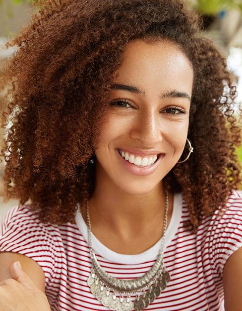 closeup of woman smiling with veneers