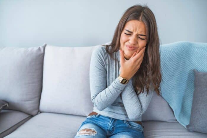 Woman has tooth pain