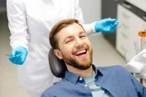 A happy, relaxed patient being treated with sedation dentistry in Houston, TX