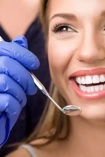 Woman with healthy smile after root canal treatment in Houston, TX