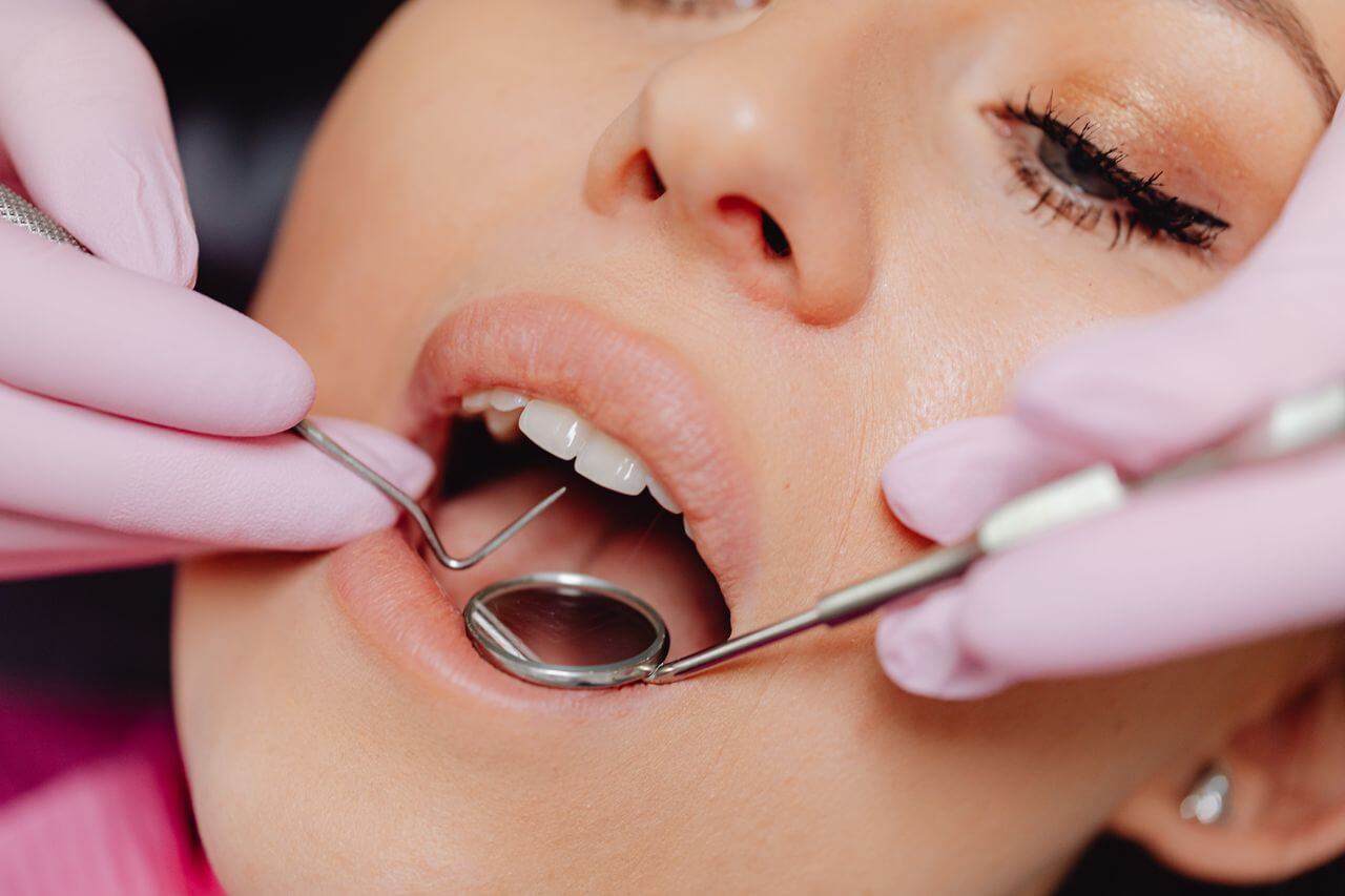 Patient receiving deep dental cleaning